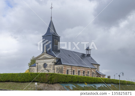 Valmy church building standing against cloudy sky 135825871