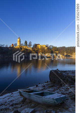 Zvikov Castle reflecting in Vltava river with old boat Zvikov Castle reflecting in Vltava river with old boat 135825909
