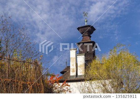 Wooden church tower with weathervane in Banska Stiavnica Wooden church tower with weathervane in Banska Stiavnica 135825911