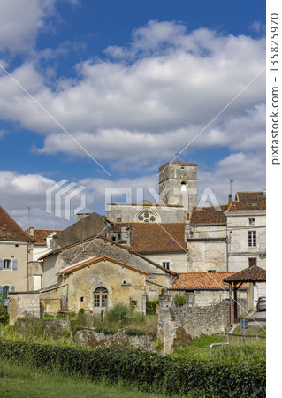 Edon village skyline featuring historic church tower and rooftops Edon village skyline featuring historic church tower and rooftops 135825970