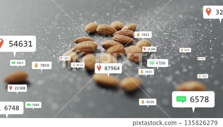 Displaying whole almonds floating at kitchen counter, with coarse salt crystals and overlay icons Displaying whole almonds floating at kitchen counter, with coarse salt crystals and overlay icons 135826279