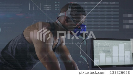 Leaning athlete wearing mask grasping handlebars pedaling in lab with monitor overlays, copy space Leaning athlete wearing mask grasping handlebars pedaling in lab with monitor overlays, copy space 135826638