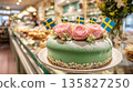 Swedish Princess cake decorated with roses in a bakery display 135827250