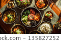 Vibrant Korean Bibimbap and banchan are beautifully presented 135827252