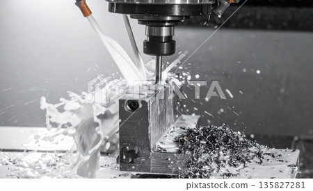 A cinematic shot of a large industrial CNC vertical machining center in operation 135827281