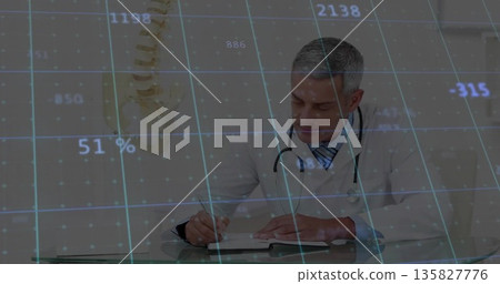 Writing male doctor noting spinal data at glass desk, with stethoscope and spinal model overlay Writing male doctor noting spinal data at glass desk, with stethoscope and spinal model overlay 135827776
