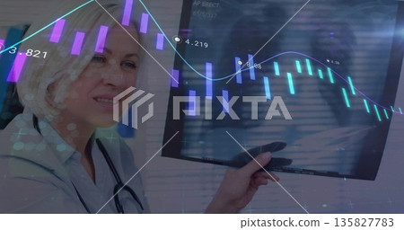 Showing doctor viewing radiograph on light panel in clinic, with digital chart overlays, copy space Showing doctor viewing radiograph on light panel in clinic, with digital chart overlays, copy space 135827783