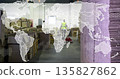 Warehouse worker wearing safety vest operating pallet jack by boxes in warehouse, world map overlay 135827862