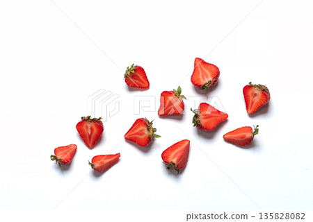Freshly Cut Strawberries Casually Arranged On A Minimalist Surface 135828082