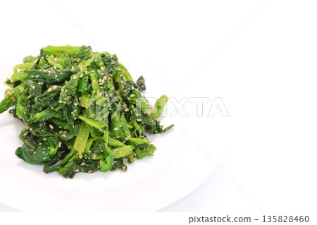 Rape blossoms with sesame dressing, spring food, bright background 135828460