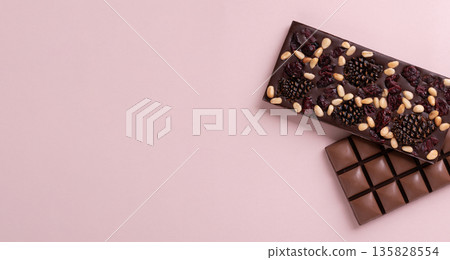 Chocolate bars with freeze-dried berries and nuts 135828554