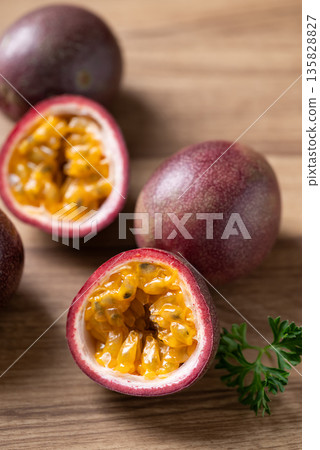 Fresh passion fruit on wooden background, Tropical fruit 135828827