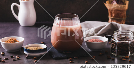 Coffee with spices and cocoa powder in a glass on the table web banner Coffee with spices and cocoa powder in a glass on the table web banner 135829617
