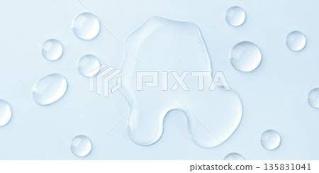 Drops of cosmetics on a blue background 135831041