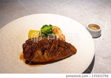 Crispy roasted golden duck breast with seasonal vegetables Crispy roasted golden duck breast with seasonal vegetables 135832798