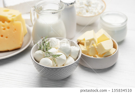 Assorted dairy products including milk, cheese, and butter Assorted dairy products including milk, cheese, and butter 135834510