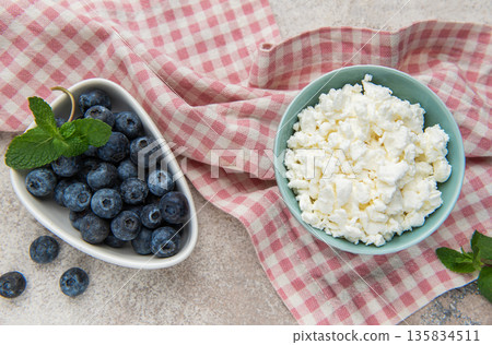 Cottage cheese and blueberries for healthy breakfast Cottage cheese and blueberries for healthy breakfast 135834511