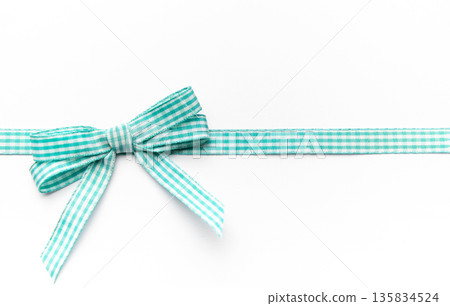 Gingham ribbon bow border on white background Gingham ribbon bow border on white background 135834524
