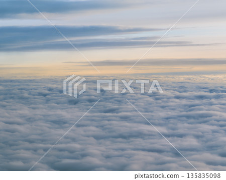 Aerial view of the sea of clouds and evening sky above Aerial view of the sea of clouds and evening sky above 135835098