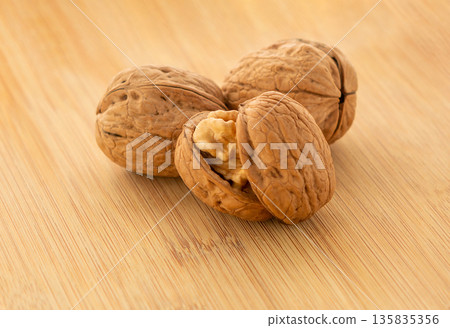 Walnuts close-up on the table Walnuts close-up on the table 135835356