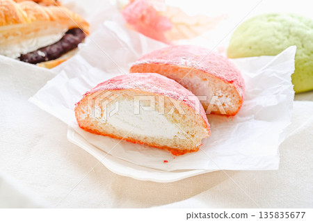 Deep-fried bread topped with strawberry sugar Deep-fried bread topped with strawberry sugar 135835677