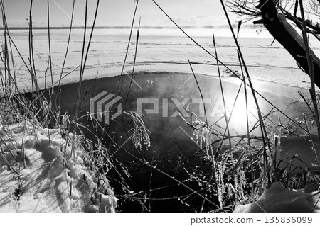 "Lake Utonai in January" The morning sun reflecting on the surface of the lake as it freezes over "Black and White" 135836099