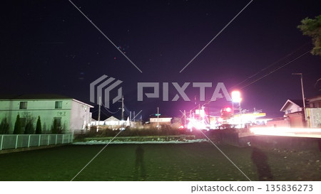 Dazzling street lights at night Dazzling street lights at night 135836273