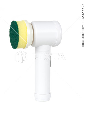 Handheld electric spin scrubber with a sponge attachment on a white background. Cordless cleaning tool 135836592