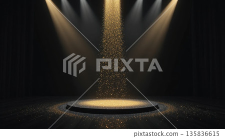 Spotlight Shines on a Circular Stage With Golden Particles in a Dark Setting During a Performance 135836615