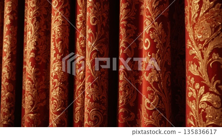 Red Curtains With Gold Patterns in an Indoor Setting During Day Light Hours Red Curtains With Gold Patterns in an Indoor Setting During Day Light Hours 135836617