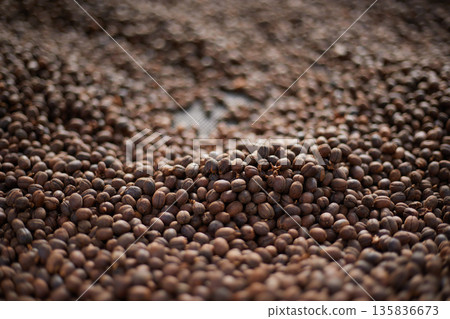 Raw coffee beans, coffee drying process on shelf natural sunlight plantation at factory 135836673
