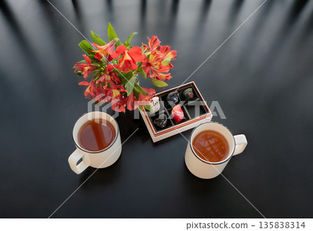 Romantic Day Flat Lay with Coffee, Flowers and Chocolates Romantic Day Flat Lay with Coffee, Flowers and Chocolates 135838314