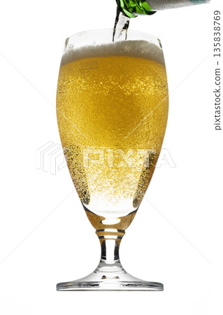 Pouring Beer into Glass Pouring Beer into Glass 135838769