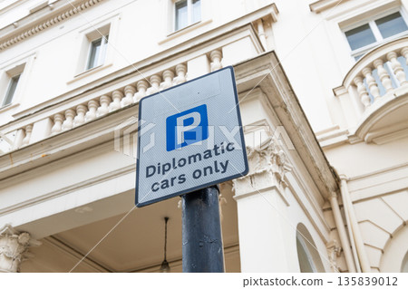 Diplomatic Cars Only Parking Sign in Front of Embassy Building 135839012