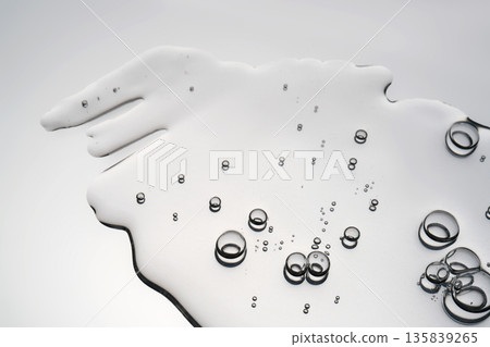 Clear liquid spreading with oxygen bubbles Clear liquid spreading with oxygen bubbles 135839265