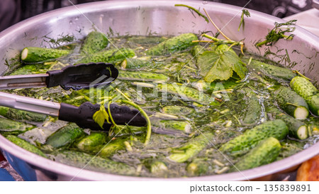 Pickled cucumbers in dill brine pot Pickled cucumbers in dill brine pot 135839891