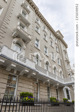 Elegant Victorian Architecture Exterior with Stone Balconies Elegant Victorian Architecture Exterior with Stone Balconies 135839952