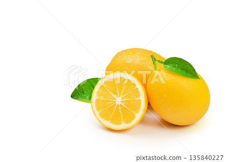 Three lemons with a leaf on top Three lemons with a leaf on top 135840227