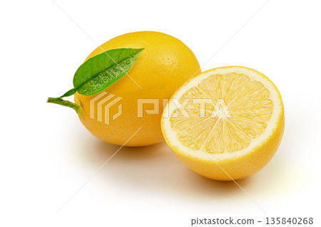 Two oranges with a leaf on one of them Two oranges with a leaf on one of them 135840268