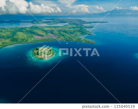 Aerial view and island with coral reef in tropics, Sumbawa. 135840519