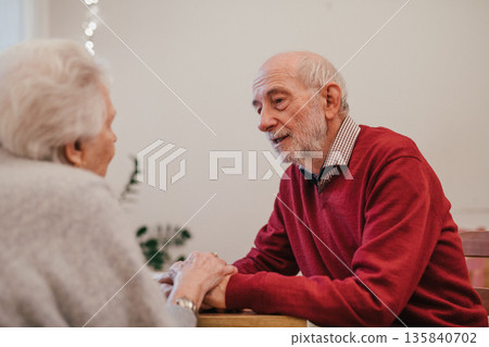 Senior couple enjoying quiet time together at home. Senior couple enjoying quiet time together at home. 135840702