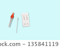 Rapid Antigen Test kit with positive result during swab COVID-19 testing. Home Isolation concept 135841119