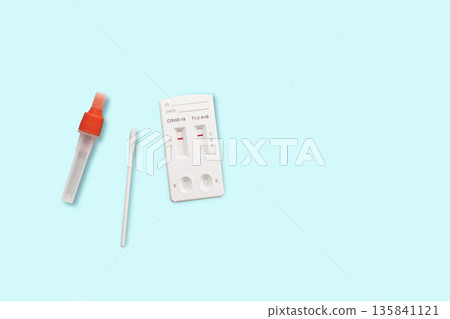 Rapid Antigen Test kit with Negative result during swab COVID-19 testing. Home Isolation concept Rapid Antigen Test kit with Negative result during swab COVID-19 testing. Home Isolation concept 135841121