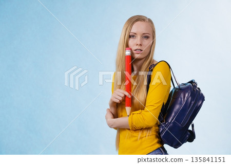 Young woman going to school 135841151