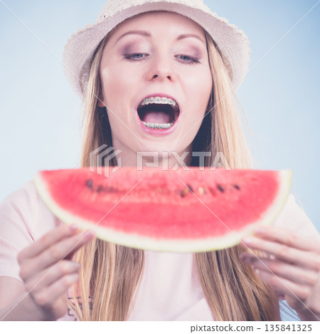 woman holding watermelon fruit woman holding watermelon fruit 135841325