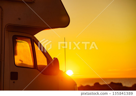 Caravan on beach at sunrise 135841389