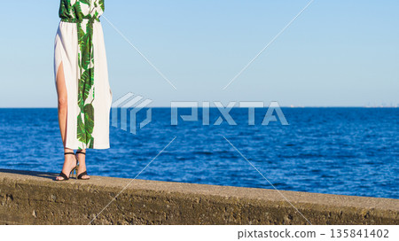 Fashion model on pier 135841402