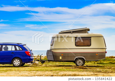Caravan trailer camping on coast, Spain. 135841422