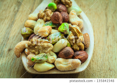 Varieties of nuts: cashew, pistachio, almond. Varieties of nuts: cashew, pistachio, almond. 135841548