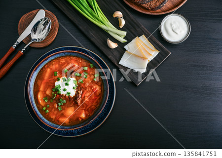 Bowl of red beetroot soup borscht with white cream Bowl of red beetroot soup borscht with white cream 135841751